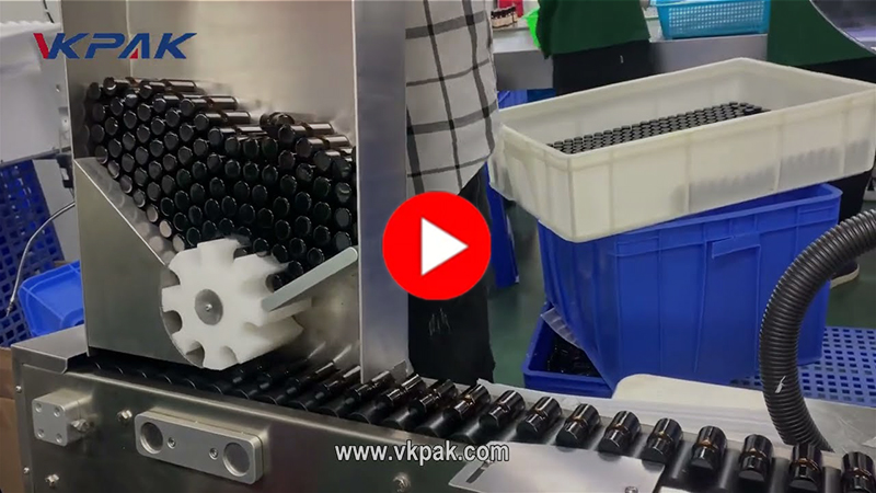 Etichettatrice automatica orizzontale per bottiglie di olio essenziale