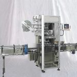 Etichettatrice automatica per manicotti termoretraibili per tappi di bottiglia
