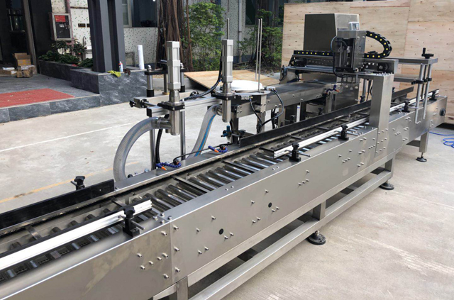 macchina tappatrice per secchio di riempimento dell'olio.jpg