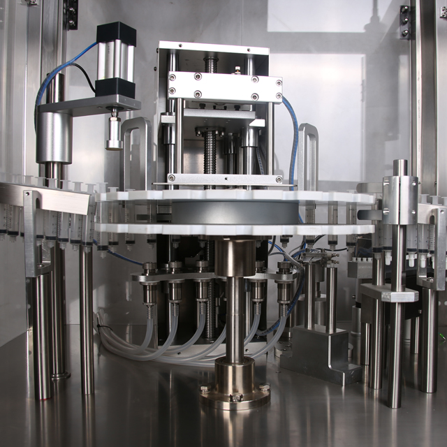 tappatrice per riempimento siringa.jpg