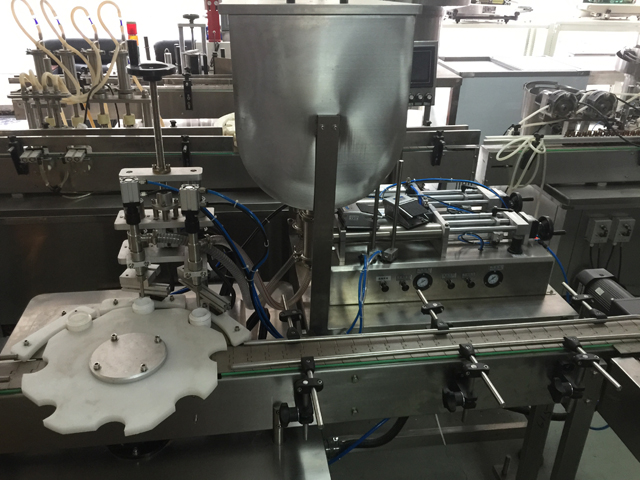 macchina riempitrice per due barattoli.jpg