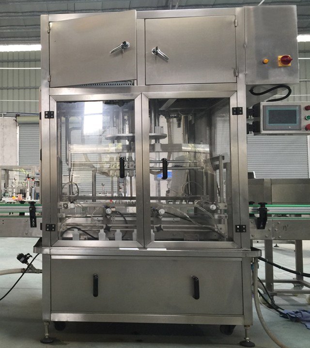 Linear filling machine with 4 filling heads MACCHINA RIEMPITRICE LINEARE.jpg