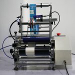 Etichettatrice semiautomatica per fiale e siringhe rotonde