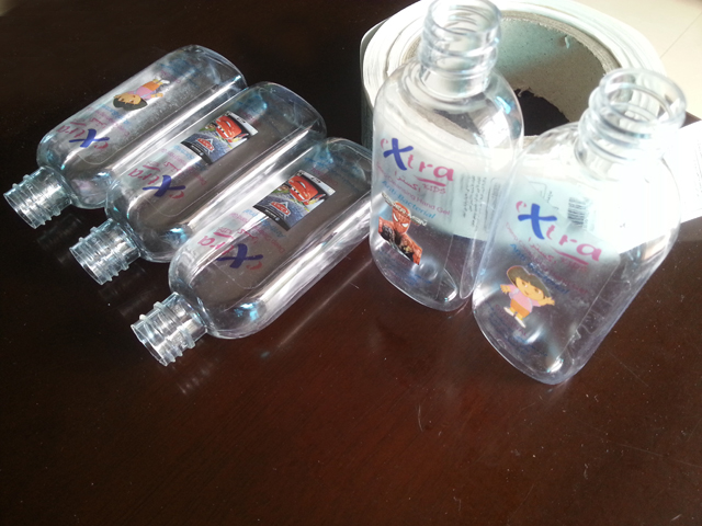 transparent labels labelled samples bottles plane surface Mrwan campione etichette trasparenti e bottiglie (3).jpg