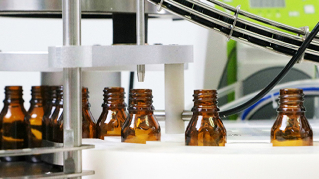 riempitrice di bottiglie tappatrice da banco tipo.jpg