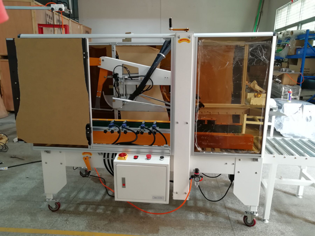 sigillatrice per cartoni con dispositivo per colla a caldo (1).jpg